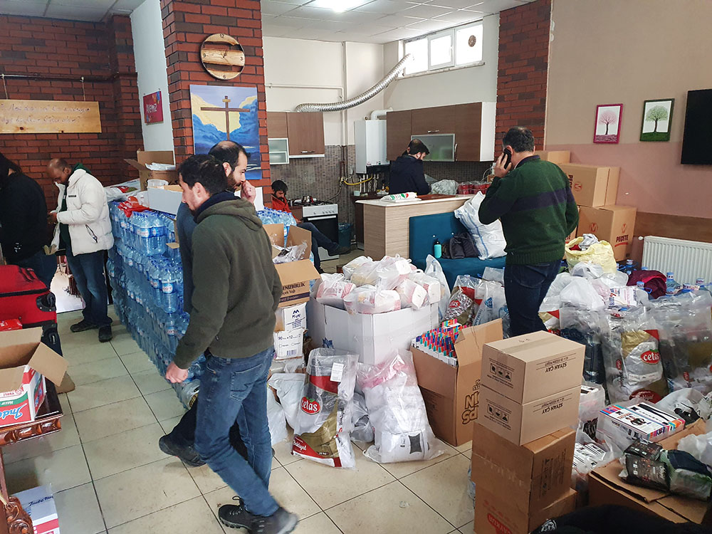 Preparing aid packages with our Turkish brothers for distribution at the church
